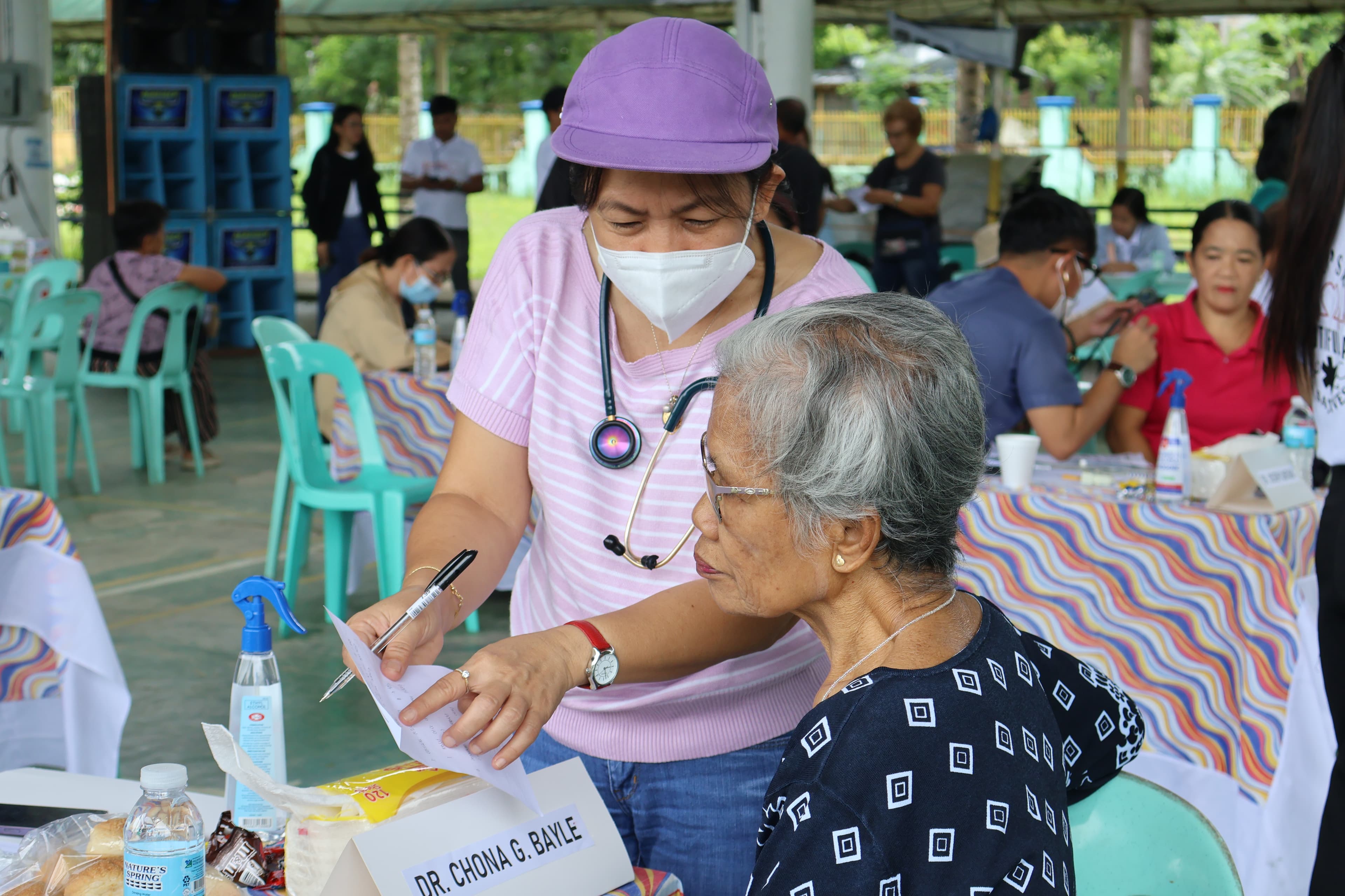 Community members receiving primary healthcare support