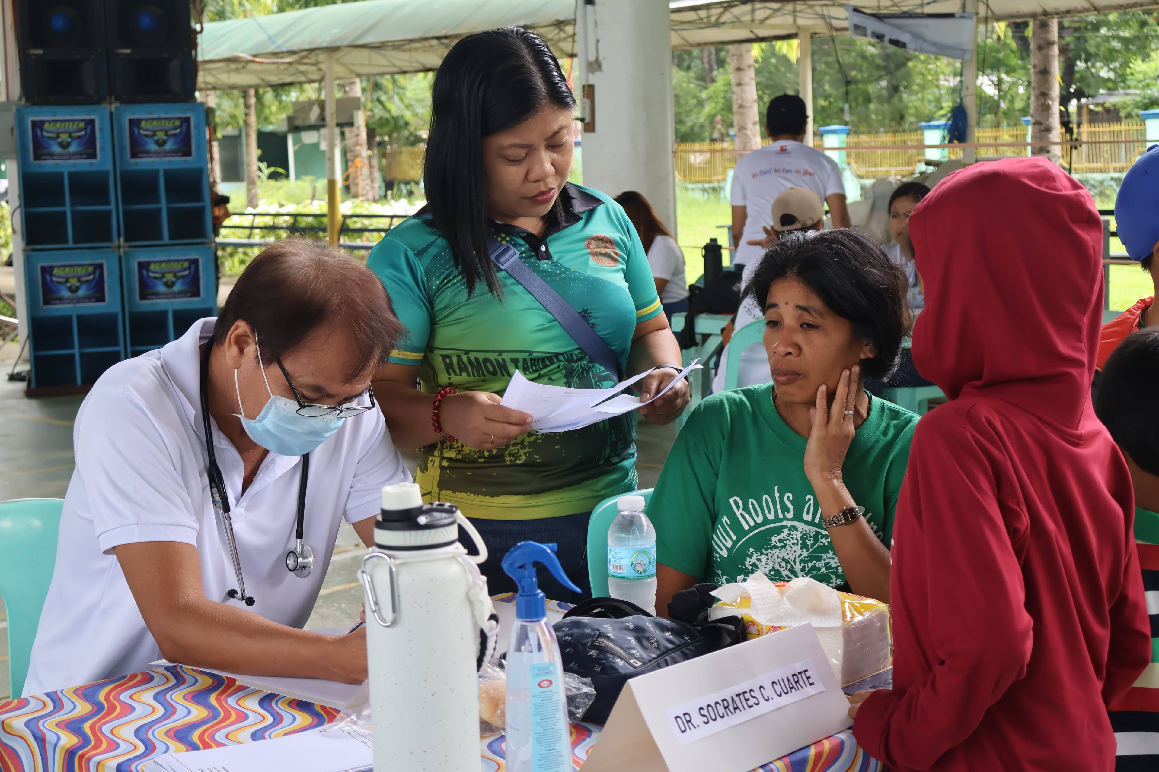 Field volunteers assisting residents